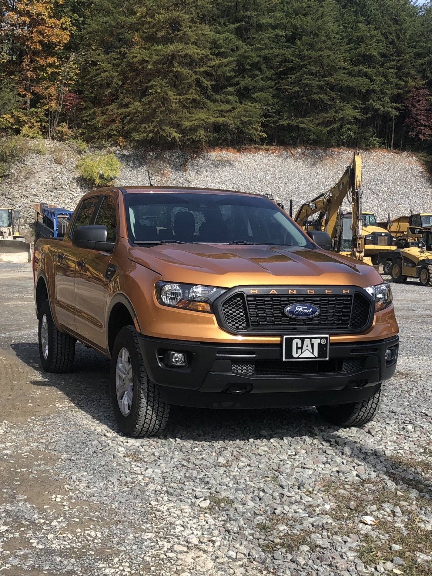 Ford Ranger Look at my Ranger parked next to stuff AD11BE98-6B3E-4686-AFC7-228C6DFE0B19