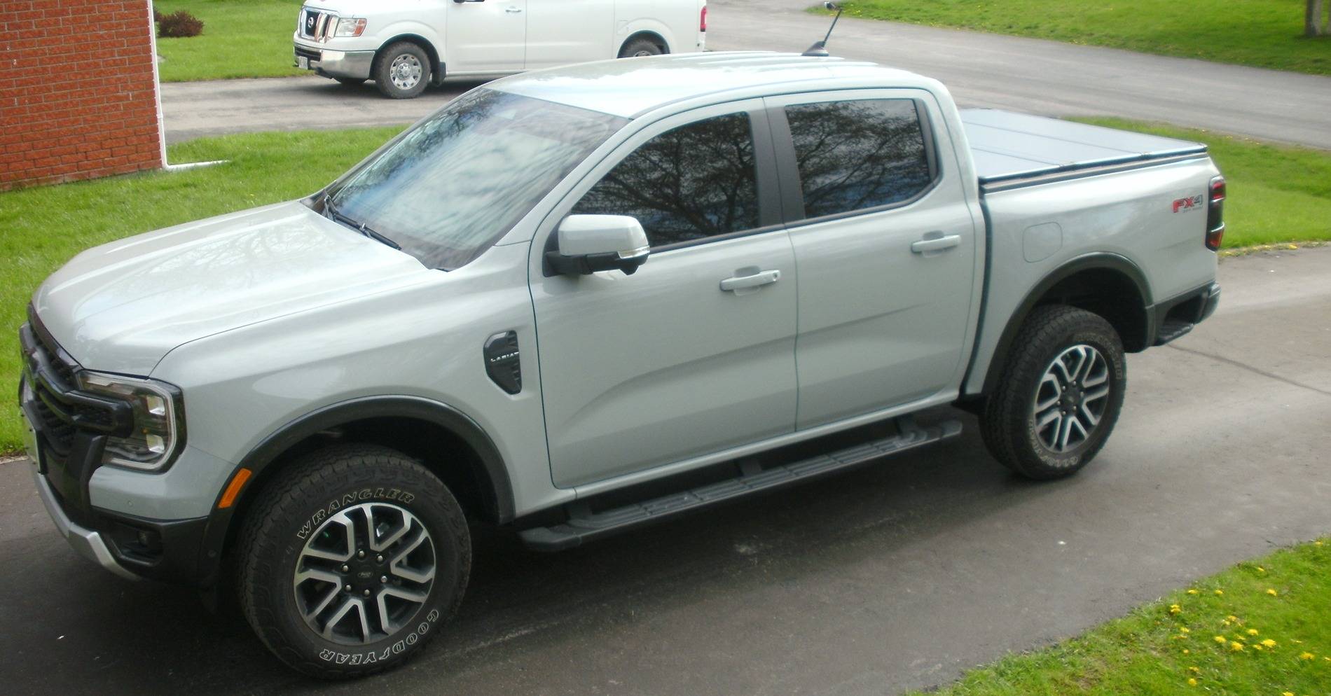 Ford Ranger Axle dump exhaust exit for rear side step clearance Drv side view tint tonneau cover