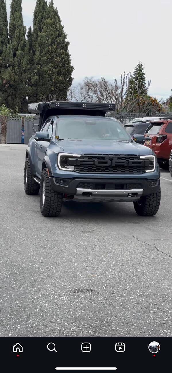 Ford Ranger Beer.Raptor on 35x12.5 tires on 17" Method MR703 Wheels with stock suspension IMG_8929