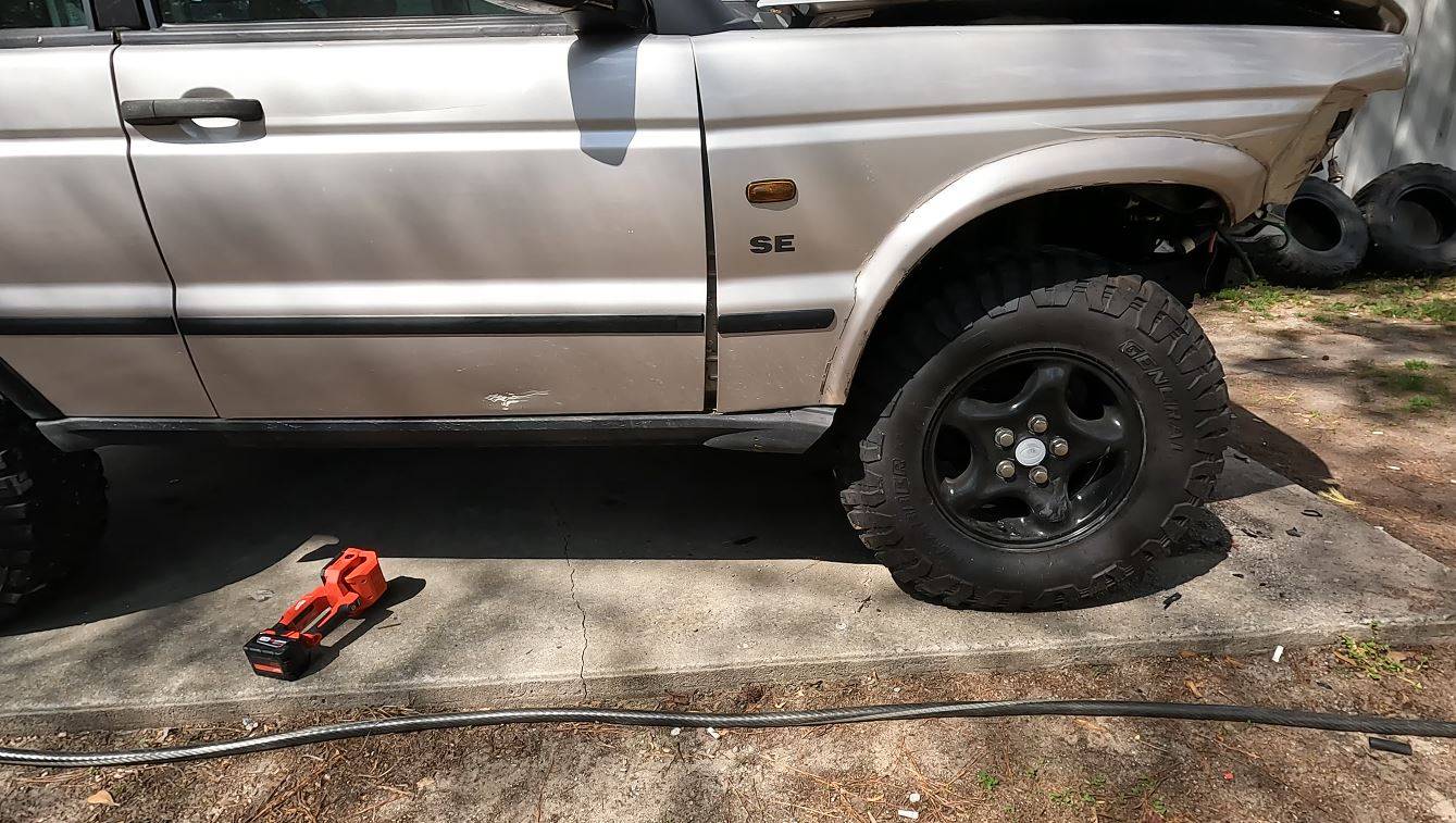 Ford Ranger What’s your automotive history & journey that led you here? Passenger Side Damage On Wheel And Sheet Metal With Axle Shoved Rearward and Toward Driver Side.JPG