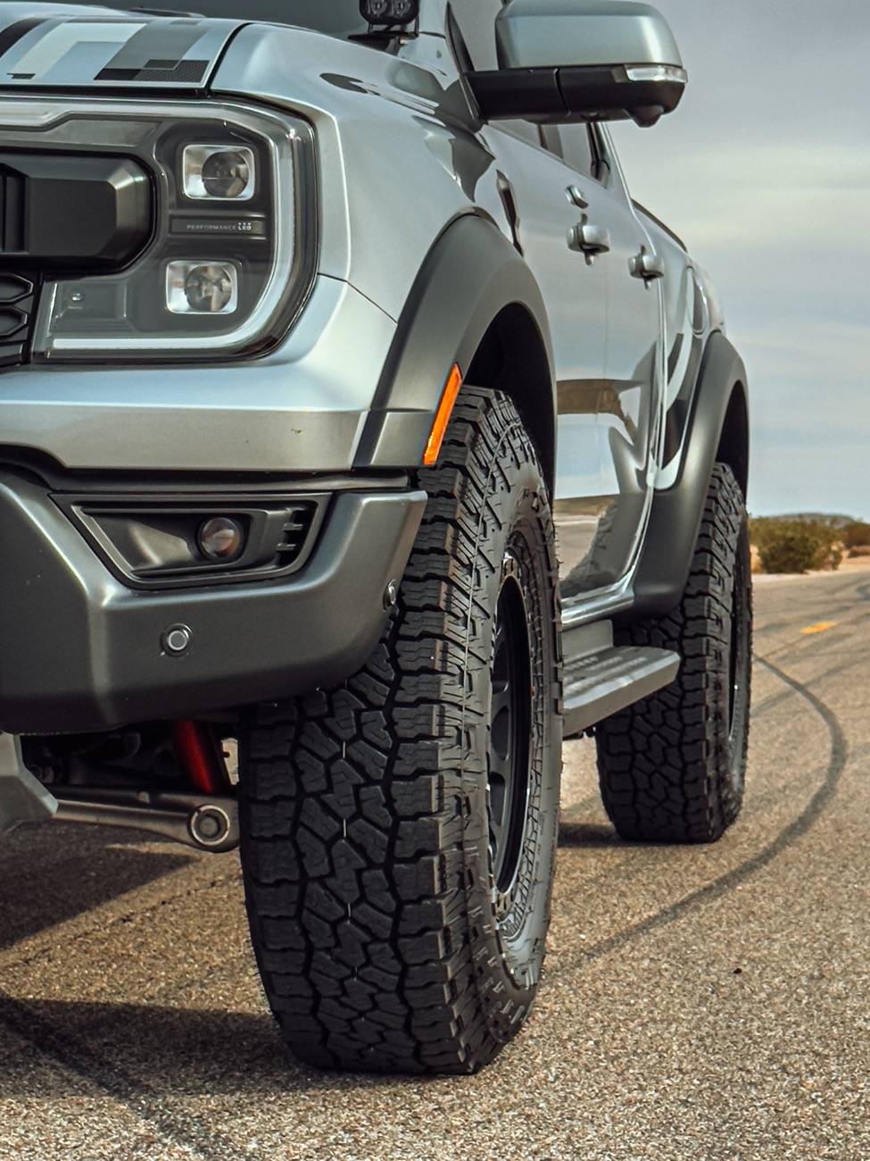 Ford Ranger FMI 2" Collars + Falken Wildpeak AT4 35/11.50/17 on 17x8.5 +25 offset KMC KM552 Wheels Raptor 16