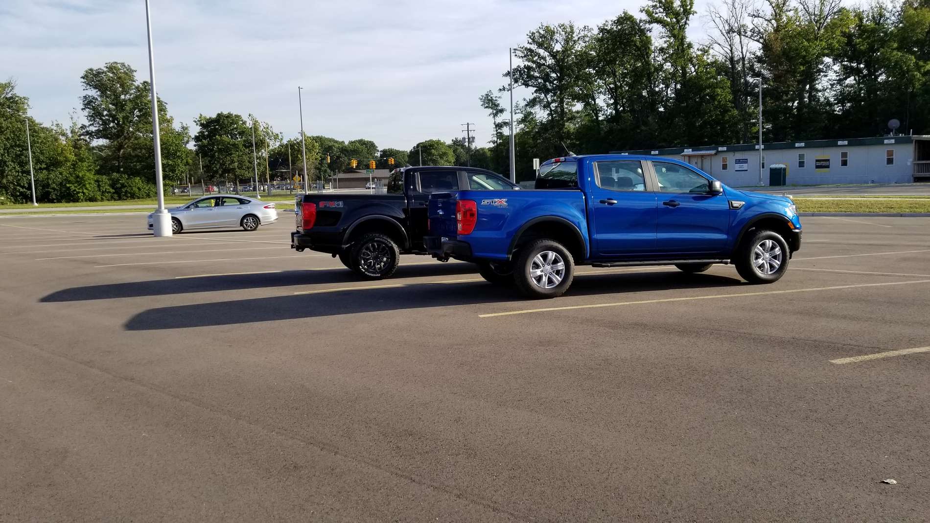Ford Ranger Look at my Ranger parked next to stuff wv0DTDVU7u7RaS-DrF2touZIMBtH3dK5ammKQafRvKegKxg6_qa3UzD895w?width=4032&height=2268&cropmode=none